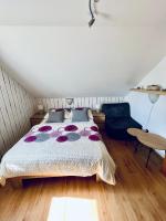 Postel nebo postele na pokoji v ubytování Apartmány v ráji (Českém)