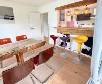 Kuchyň nebo kuchyňský kout v ubytování Ferienwohnung Strandbad - Alpen PopArt am See