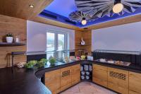 a kitchen with a counter and a blue ceiling at Landhotel Geyer in Kipfenberg