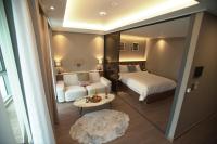 Sienna Ambassador Residenceにあるベッド