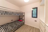 Posteľ alebo postele v izbe v ubytovaní Apartment Aurora