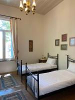 Posteľ alebo postele v izbe v ubytovaní Yioklima - Renovated Neoclassical House with two bedrooms