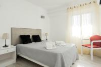 Postel nebo postele na pokoji v ubytování Chantal Apartment - Near the beach - Quarteira