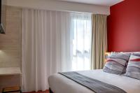 Posteľ alebo postele v izbe v ubytovaní Hôtel Akena Chauray-Niort