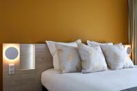 Posteľ alebo postele v izbe v ubytovaní Hôtel Akena Chauray-Niort
