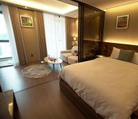 Sienna Ambassador Residenceにあるベッド
