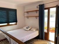 Postel nebo postele na pokoji v ubytování Casa Buganvilla