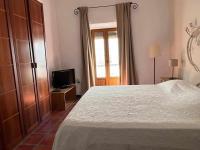 Postel nebo postele na pokoji v ubytování Casa Buganvilla