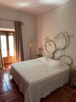 Postel nebo postele na pokoji v ubytování Casa Buganvilla