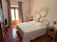 Postel nebo postele na pokoji v ubytování Casa Buganvilla