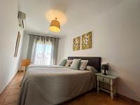 Posteľ alebo postele v izbe v ubytovaní Apartamentos Villa Torcal