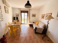 Televízia a/alebo spoločenská miestnosť v ubytovaní Apartamentos Villa Torcal