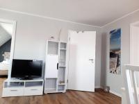 TV a/nebo společenská místnost v ubytování Haus Dietrich Wohnung 2