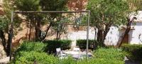 Zahrada ubytování Casas Cueva y Cortijo La Tala en Guadix