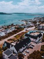 una vista aérea de un pueblo junto al agua en The Farmhouse Hotel, en Langebaan