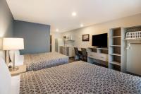 WoodSpring Suites Hermitage - Nashville Airportにあるベッド