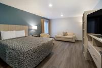 WoodSpring Suites Hermitage - Nashville Airportにあるベッド