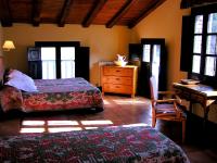Postel nebo postele na pokoji v ubytování La Fabrica Casa Rural