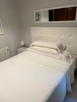 Postel nebo postele na pokoji v ubytování Hostal la Picota