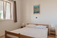 Postel nebo postele na pokoji v ubytování Rasin Apartments