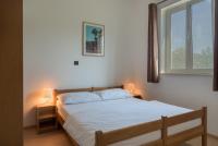 Postel nebo postele na pokoji v ubytování Rasin Apartments