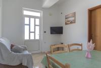TV a/nebo společenská místnost v ubytování Rasin Apartments