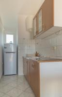 Kuchyň nebo kuchyňský kout v ubytování Rasin Apartments