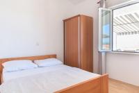 Postel nebo postele na pokoji v ubytování Rasin Apartments