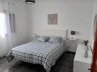 A bed or beds in a room at Casa Caleta Caballo