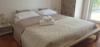 Posteľ alebo postele v izbe v ubytovaní Apartments Stari Pavle