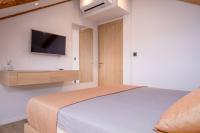 Postel nebo postele na pokoji v ubytování Casa Antika Suites