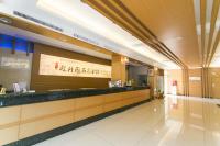 a restaurant with a long counter in a building at Guanziling Lin Kuei Yuan Hot Spring Resort in Baihe