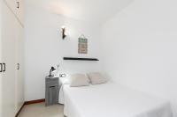 Postel nebo postele na pokoji v ubytování UHC Novelty Apartments