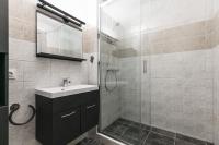 Koupelna v ubytování UHC Novelty Apartments