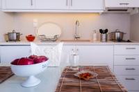 Kuchyňa alebo kuchynka v ubytovaní Milos Bay Suites