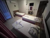 Postel nebo postele na pokoji v ubytování Best Alanya Hotel