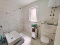 Kúpeľňa v ubytovaní APARTMANI NADA MUSTAPIC