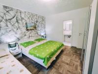 Posteľ alebo postele v izbe v ubytovaní APARTMANI NADA MUSTAPIC