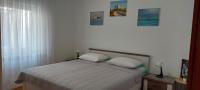 Posteľ alebo postele v izbe v ubytovaní Apartment Nereo