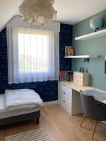 Posteľ alebo postele v izbe v ubytovaní La BERNIQUE Maison familiale Confort & Espace 3 chambres Jardin WIFI