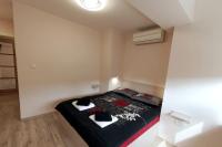 Postel nebo postele na pokoji v ubytování Bright City Apartment Varna