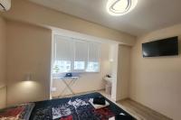 TV a/nebo společenská místnost v ubytování Bright City Apartment Varna