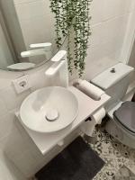 Koupelna v ubytování Apartamento a 10 minutos de la Calle Laurel