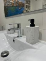 Koupelna v ubytování Apartamento a 10 minutos de la Calle Laurel