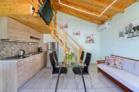 A kitchen or kitchenette at Georgios House