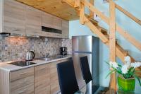 A kitchen or kitchenette at Georgios House