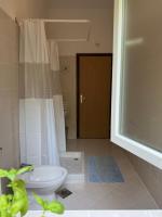 Kúpeľňa v ubytovaní Villa Claudia Beach Apartment