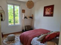 Posteľ alebo postele v izbe v ubytovaní La Maison des 4 moineaux