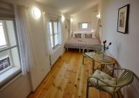 Postel nebo postele na pokoji v ubytování Queen Bee apartments
