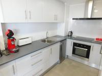 Kuchyňa alebo kuchynka v ubytovaní GMID IMMO Apartamento Oasis